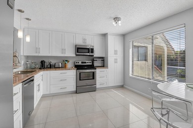 This tastefully updated condo is move-in ready and has been on Indian Spring Golf and Country Club in Florida - for sale on GolfHomes.com, golf home, golf lot