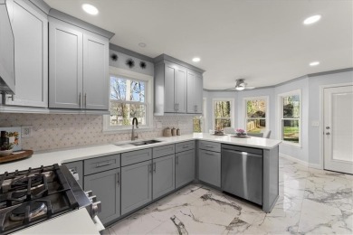 This stunning 4BD/3.5BA home is beautifully updated in the on Towne Lake Hills Golf Club in Georgia - for sale on GolfHomes.com, golf home, golf lot