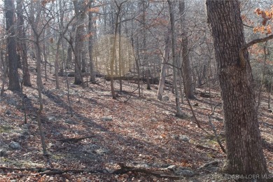 This property features 2 combined lots, creating a spacious on The Club At Porto Cima in Missouri - for sale on GolfHomes.com, golf home, golf lot