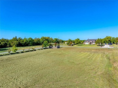 This prime corner lot is nestled in the peaceful, upscale on Denison Country Club in Texas - for sale on GolfHomes.com, golf home, golf lot