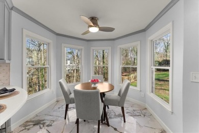 This stunning 4BD/3.5BA home is beautifully updated in the on Towne Lake Hills Golf Club in Georgia - for sale on GolfHomes.com, golf home, golf lot