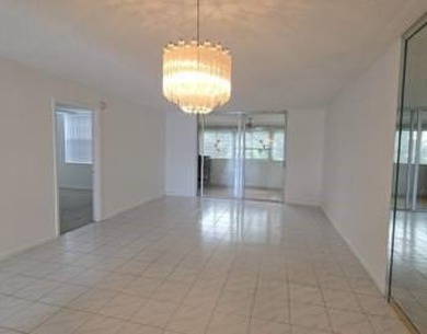 Spacious and bright 2-bed, 2-bath + den/office condo in Palm on Oriole Golf and Tennis Club in Florida - for sale on GolfHomes.com, golf home, golf lot