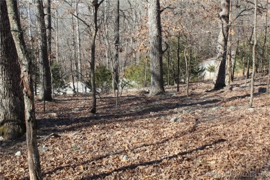 This property features 2 combined lots, creating a spacious on The Club At Porto Cima in Missouri - for sale on GolfHomes.com, golf home, golf lot