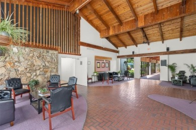 Spacious and bright 2-bed, 2-bath + den/office condo in Palm on Oriole Golf and Tennis Club in Florida - for sale on GolfHomes.com, golf home, golf lot