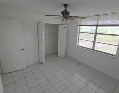 Spacious and bright 2-bed, 2-bath + den/office condo in Palm on Oriole Golf and Tennis Club in Florida - for sale on GolfHomes.com, golf home, golf lot