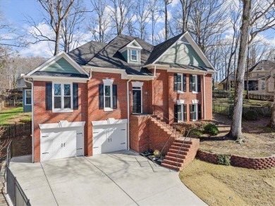 This stunning 4BD/3.5BA home is beautifully updated in the on Towne Lake Hills Golf Club in Georgia - for sale on GolfHomes.com, golf home, golf lot