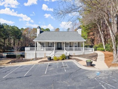 This stunning 4BD/3.5BA home is beautifully updated in the on Towne Lake Hills Golf Club in Georgia - for sale on GolfHomes.com, golf home, golf lot