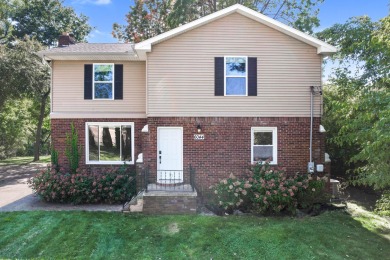 Spacious and updated, this 5-bedroom, 2-bathroom home offers 2 on IMA Brookwood Golf Course in Michigan - for sale on GolfHomes.com, golf home, golf lot