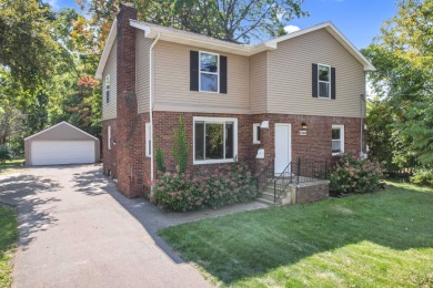 Spacious and updated, this 5-bedroom, 2-bathroom home offers 2 on IMA Brookwood Golf Course in Michigan - for sale on GolfHomes.com, golf home, golf lot