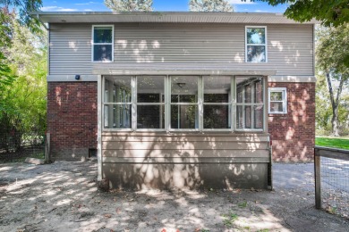 Spacious and updated, this 5-bedroom, 2-bathroom home offers 2 on IMA Brookwood Golf Course in Michigan - for sale on GolfHomes.com, golf home, golf lot