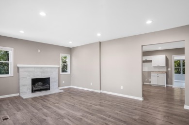 Spacious and updated, this 5-bedroom, 2-bathroom home offers 2 on IMA Brookwood Golf Course in Michigan - for sale on GolfHomes.com, golf home, golf lot