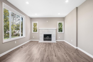 Spacious and updated, this 5-bedroom, 2-bathroom home offers 2 on IMA Brookwood Golf Course in Michigan - for sale on GolfHomes.com, golf home, golf lot