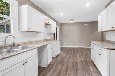Spacious and updated, this 5-bedroom, 2-bathroom home offers 2 on IMA Brookwood Golf Course in Michigan - for sale on GolfHomes.com, golf home, golf lot