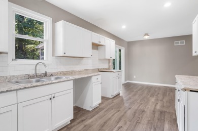 Spacious and updated, this 5-bedroom, 2-bathroom home offers 2 on IMA Brookwood Golf Course in Michigan - for sale on GolfHomes.com, golf home, golf lot