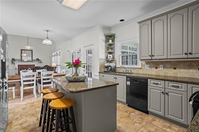 Welcome home to this timeless brick traditional nestled at the on Brookstone Golf and Country Club in Georgia - for sale on GolfHomes.com, golf home, golf lot