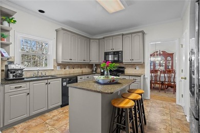 Welcome home to this timeless brick traditional nestled at the on Brookstone Golf and Country Club in Georgia - for sale on GolfHomes.com, golf home, golf lot