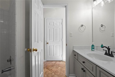 Welcome home to this timeless brick traditional nestled at the on Brookstone Golf and Country Club in Georgia - for sale on GolfHomes.com, golf home, golf lot