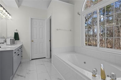 Welcome home to this timeless brick traditional nestled at the on Brookstone Golf and Country Club in Georgia - for sale on GolfHomes.com, golf home, golf lot