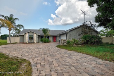 Spacious 4 - bedroom home on golf course with cozy fireplace is on Rockledge Country Club in Florida - for sale on GolfHomes.com, golf home, golf lot