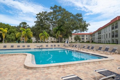 Welcome to Mediterranean Manor, a vibrant waterfront community on The Dunedin Country Club in Florida - for sale on GolfHomes.com, golf home, golf lot