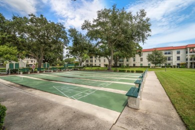 Welcome to Mediterranean Manor, a vibrant waterfront community on The Dunedin Country Club in Florida - for sale on GolfHomes.com, golf home, golf lot