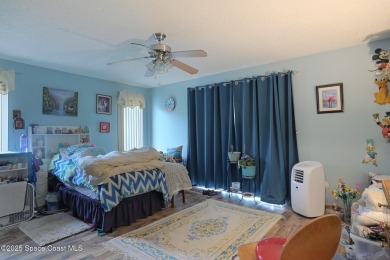 Spacious 4 - bedroom home on golf course with cozy fireplace is on Rockledge Country Club in Florida - for sale on GolfHomes.com, golf home, golf lot