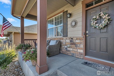 Welcome home to this beautifully maintained 2-story in Water on Pelican Lakes Golf and Country Club in Colorado - for sale on GolfHomes.com, golf home, golf lot