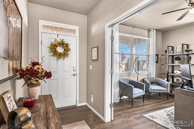 Welcome home to this beautifully maintained 2-story in Water on Pelican Lakes Golf and Country Club in Colorado - for sale on GolfHomes.com, golf home, golf lot