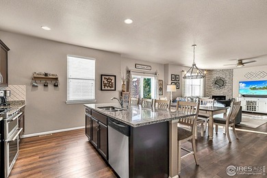 Welcome home to this beautifully maintained 2-story in Water on Pelican Lakes Golf and Country Club in Colorado - for sale on GolfHomes.com, golf home, golf lot