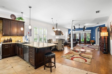 This highly coveted creek front lot on Woodstream in East Lake on East Lake Woodlands Country Club in Florida - for sale on GolfHomes.com, golf home, golf lot