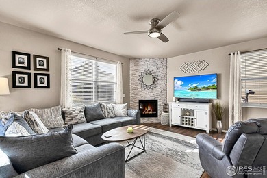 Welcome home to this beautifully maintained 2-story in Water on Pelican Lakes Golf and Country Club in Colorado - for sale on GolfHomes.com, golf home, golf lot