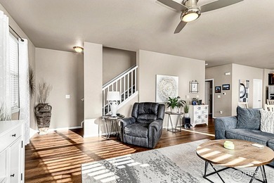 Welcome home to this beautifully maintained 2-story in Water on Pelican Lakes Golf and Country Club in Colorado - for sale on GolfHomes.com, golf home, golf lot