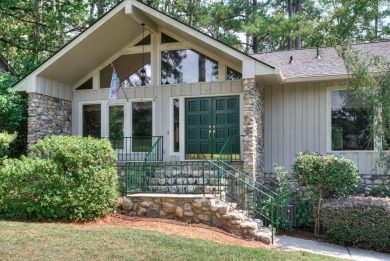 This contemporary stone and cedar West Lake home is nestled on a on West Lake Country Club in Georgia - for sale on GolfHomes.com, golf home, golf lot