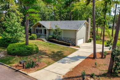 This contemporary stone and cedar West Lake home is nestled on a on West Lake Country Club in Georgia - for sale on GolfHomes.com, golf home, golf lot