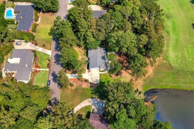 This contemporary stone and cedar West Lake home is nestled on a on West Lake Country Club in Georgia - for sale on GolfHomes.com, golf home, golf lot