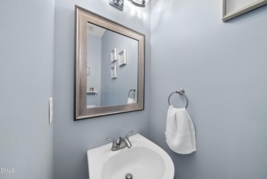 Beautifully maintained home is situated on a large lot next to a on The Crossings at Grove Park in North Carolina - for sale on GolfHomes.com, golf home, golf lot