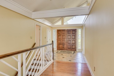 This contemporary stone and cedar West Lake home is nestled on a on West Lake Country Club in Georgia - for sale on GolfHomes.com, golf home, golf lot