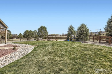 This beautiful 2-story home is situated on a spacious, 11,134 on Pelican Lakes Golf and Country Club in Colorado - for sale on GolfHomes.com, golf home, golf lot