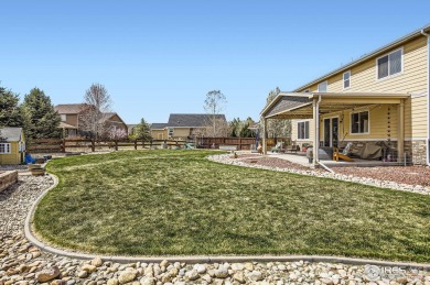 This beautiful 2-story home is situated on a spacious, 11,134 on Pelican Lakes Golf and Country Club in Colorado - for sale on GolfHomes.com, golf home, golf lot