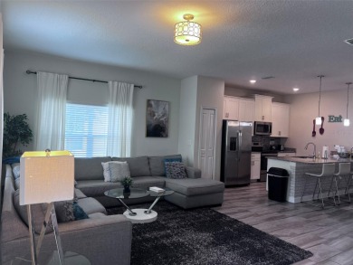 Ultimate Investment Opportunity - Fully Furnished Townhome in on The Oasis Club at Champions Gate in Florida - for sale on GolfHomes.com, golf home, golf lot