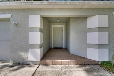 Charming concrete block home in the 55+ community of Spanish on Spanish Lakes I in Florida - for sale on GolfHomes.com, golf home, golf lot