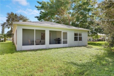 Charming concrete block home in the 55+ community of Spanish on Spanish Lakes I in Florida - for sale on GolfHomes.com, golf home, golf lot