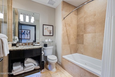 This luxury Waldorf Astoria condominium is set in the Canyons on Canyons Golf Course in Utah - for sale on GolfHomes.com, golf home, golf lot