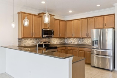 Welcome to this move-in ready 4-bedroom, 2-bath home in the on Stoneybrook West in Florida - for sale on GolfHomes.com, golf home, golf lot