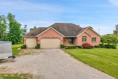 Discover your dream home with this stunning 2,146 square foot on Belle River Golf and Country Club in Michigan - for sale on GolfHomes.com, golf home, golf lot