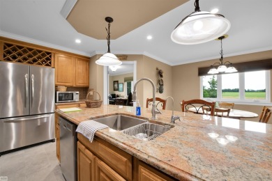 Discover your dream home with this stunning 2,146 square foot on Belle River Golf and Country Club in Michigan - for sale on GolfHomes.com, golf home, golf lot