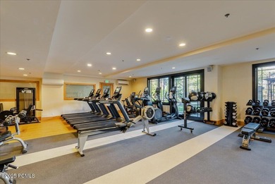 This luxury Waldorf Astoria condominium is set in the Canyons on Canyons Golf Course in Utah - for sale on GolfHomes.com, golf home, golf lot