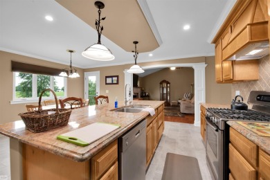 Discover your dream home with this stunning 2,146 square foot on Belle River Golf and Country Club in Michigan - for sale on GolfHomes.com, golf home, golf lot