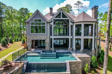 The PERFECT Mixture of Modern LUXE with a touch of Lake House on Reynolds Lake Oconee - The National  in Georgia - for sale on GolfHomes.com, golf home, golf lot