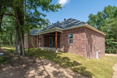 Welcome to this beautiful new construction home in the gated on Diamondhead Golf and Country Club in Arkansas - for sale on GolfHomes.com, golf home, golf lot